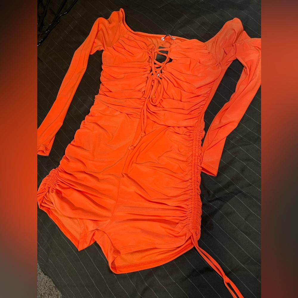 Orange Romper, shorts tie up and tie up on the chest area